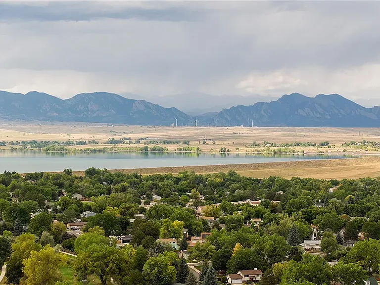 View of Stanley Lake with over 5 miles of public walking / biking paths. Spectacular views of the Boulder Flatirons and Denver foothills.