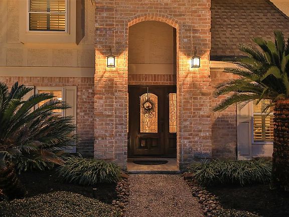 BEAUTIFUL NEW DOOR MASTERS FRONT DOOR WITH SIDE PANELS - The entrance to this home is lovely and has a covered porch with lamp lighting on each side. This home has a complete window replacement package with LowE, Double Hung Argon Windows! A wonderfu