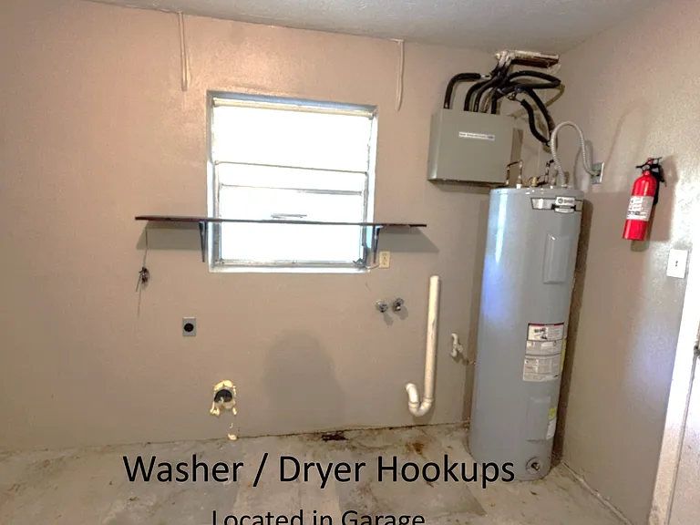 Washer and Dryer Hookup located in garage.