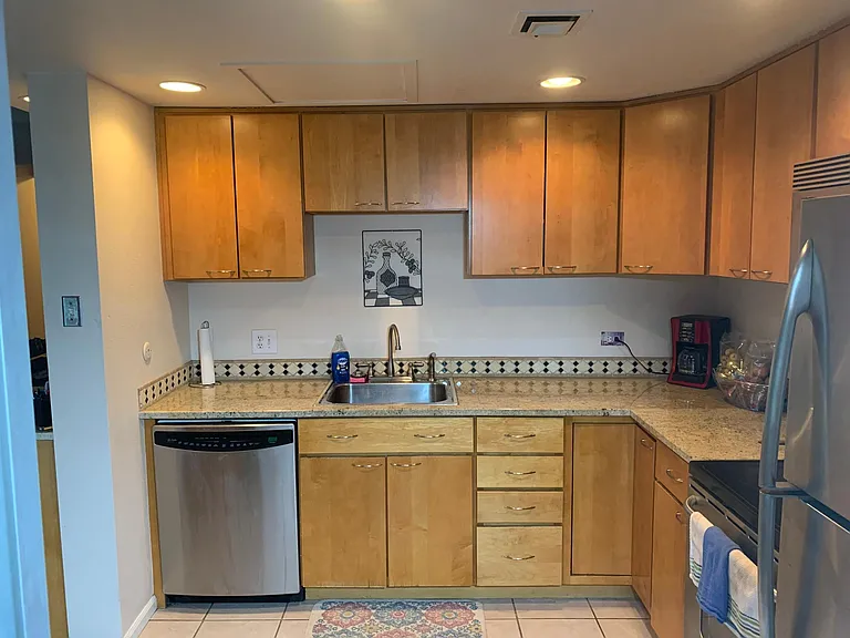 View of the other side of the kitchen towards the dining area.