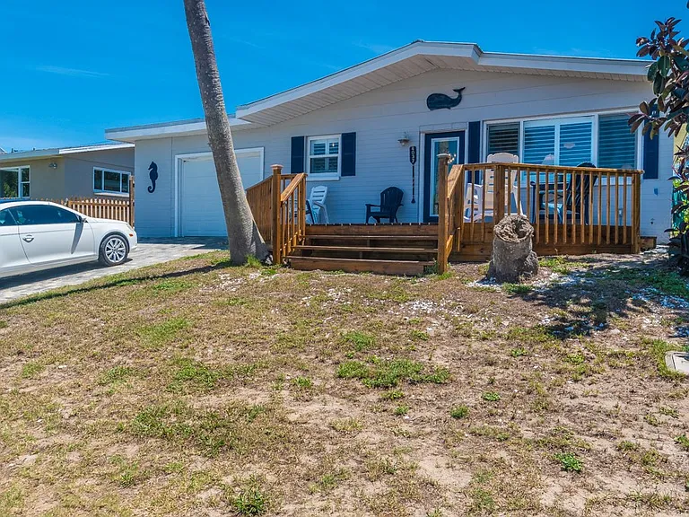 front of house with large deck