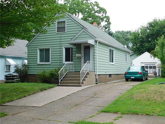 FRONT EXT HOUSE & GARAGE