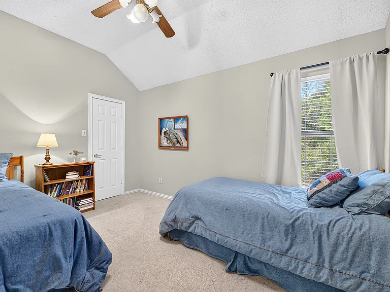 Large bedroom with a generous walk-in closet.