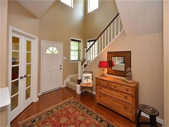 Spacious entry with french doors to Study
