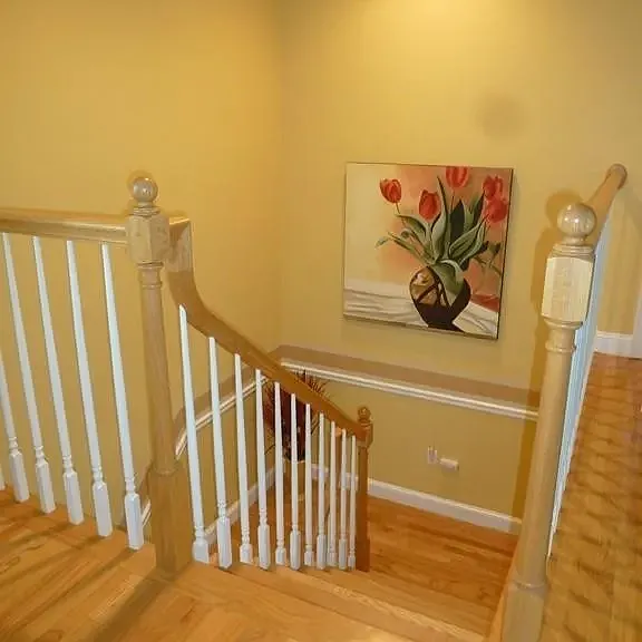 stairs doen from second floor. This area has since been painted a more neutral color as seen in other photos.