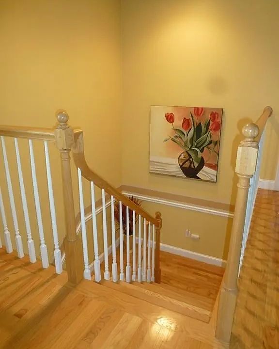 stairs doen from second floor. This area has since been painted a more neutral color as seen in other photos.