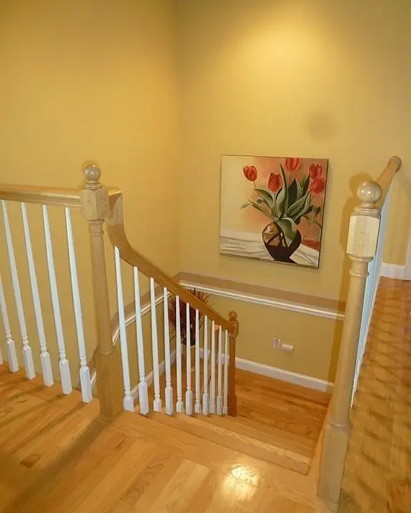 stairs doen from second floor. This area has since been painted a more neutral color as seen in other photos.