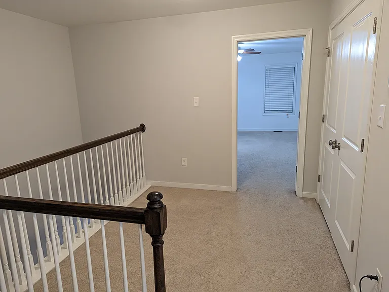 Stairs from mainfloor, Laundry, & master bed; Note: Carpet in this pic, replaced with grey color carpet, can be see in next pic