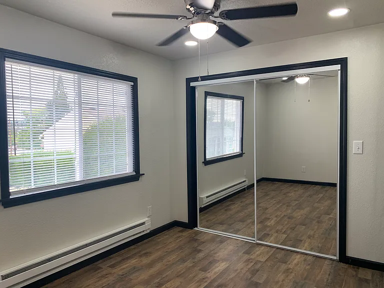 Interior of bedroom facing Oak Street