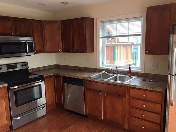 Similar kitchen from adjacent model - unit 25 kitchen is white