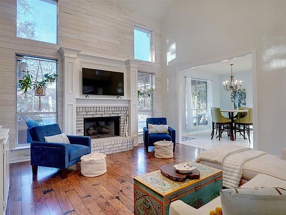 Wood Laminate Flooring and Gas Log Fireplace (Can convert to wood burning if desired.)