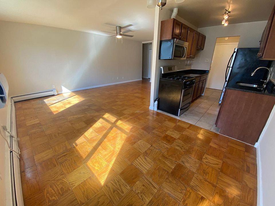 Open floor plan with enough space for dining, desk and living areas