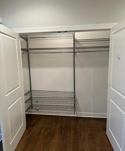 Closet with Elfa brand storage by Container Store