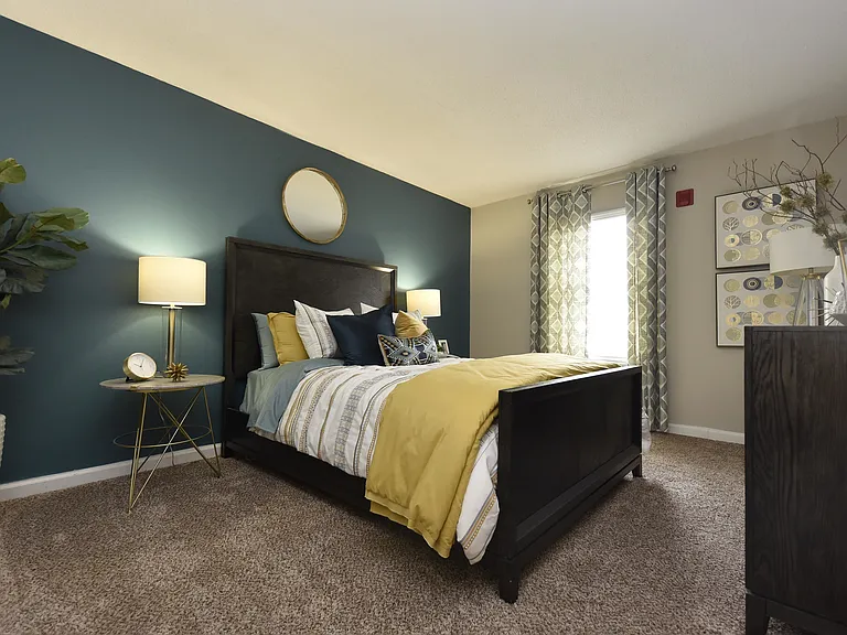 Experience sophisticated comfort in this beautifully designed bedroom.