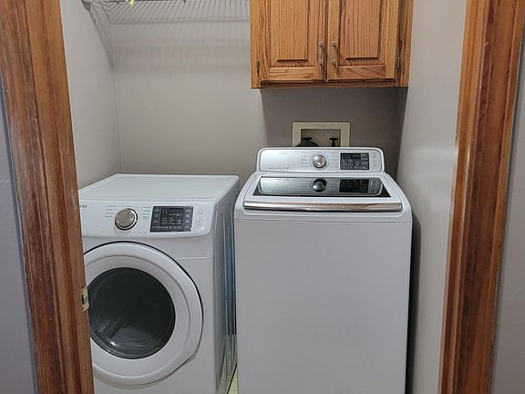 laundry room with samsung appliances