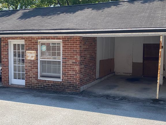 Laundry facility to left. Covered car port to right.