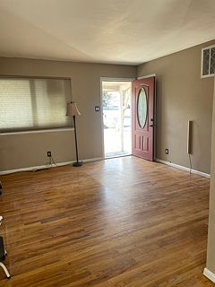Living room looking toward front door