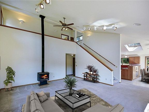 Living Room and stairs to Loft and Bonus Room.