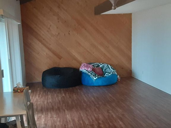 Living room leads to balcony.