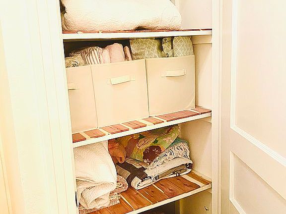 Downstairs linen closet