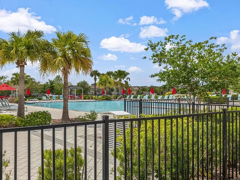 7407 Rosy Periwinkle Ct — Photo 29