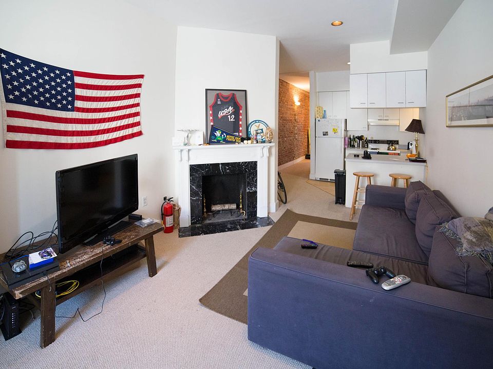 Living room with decorative fireplace
