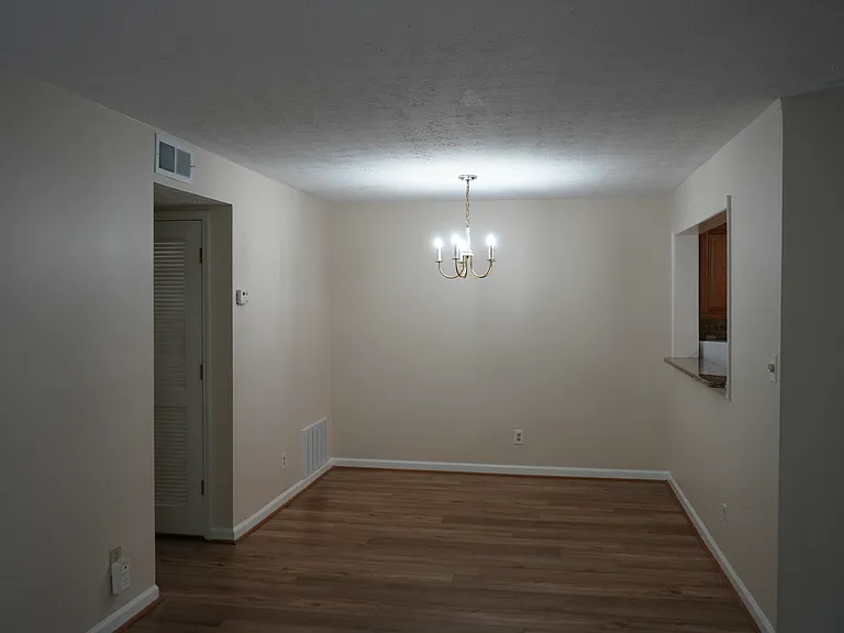 Dining Room with Service Window Leading to the Kitchen