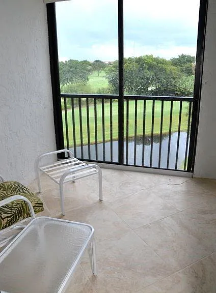 7040 Pelican Bay Blvd #D-404 — Photo 16