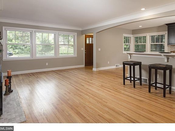 Spacious living area with new Marvin windows throughout.