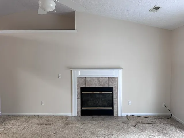 Living Room; equipped with a gas burning fireplace