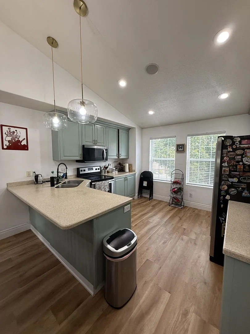 Welcome home to this spacious 4-bedroom, 3-bath residence in Spanish Fork, UT! — Photo 2
