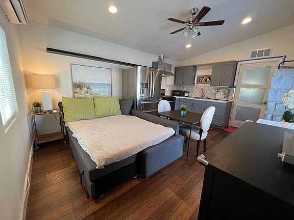 living space with convertible couch