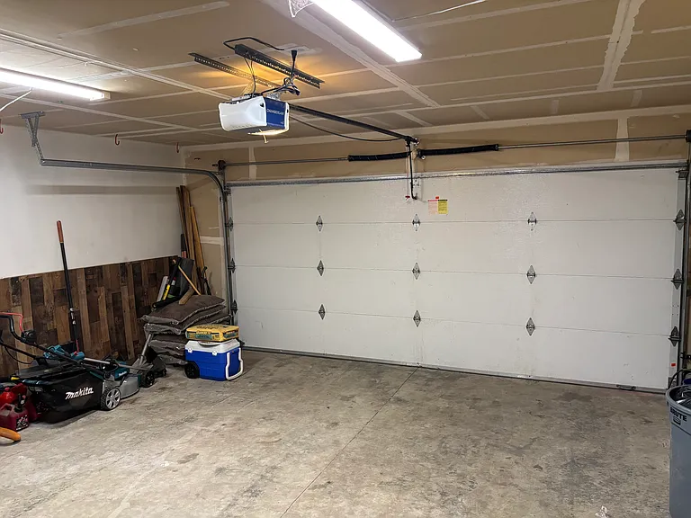 Large garage fits 2 cars and has washer, dryer connections