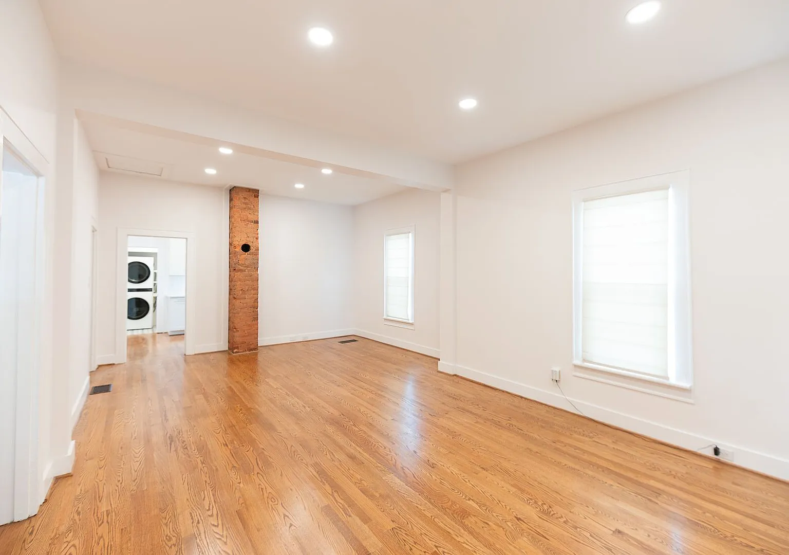 Stunning 3 Bedroom Home with Hardwood Floors & Luxury Bathrooms — Photo 4