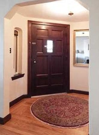 Charm and character great you in the interior Entryway.