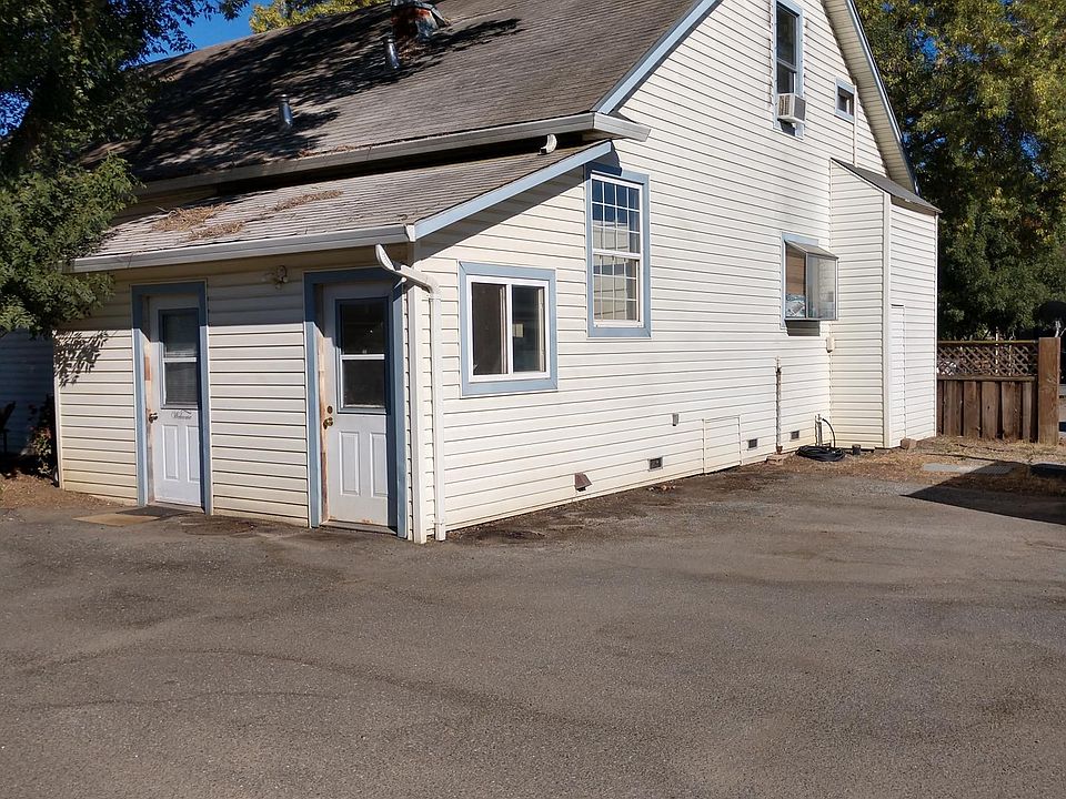 Upstairs apt - Entrance on the right side of the house, with parking to the right of the door.