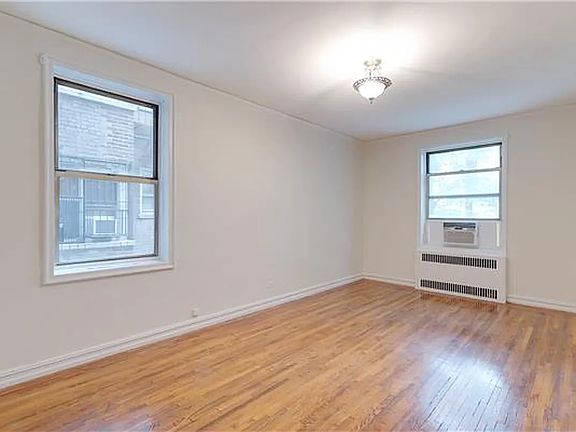 3rd image of 160 E 3rd St APT 1G