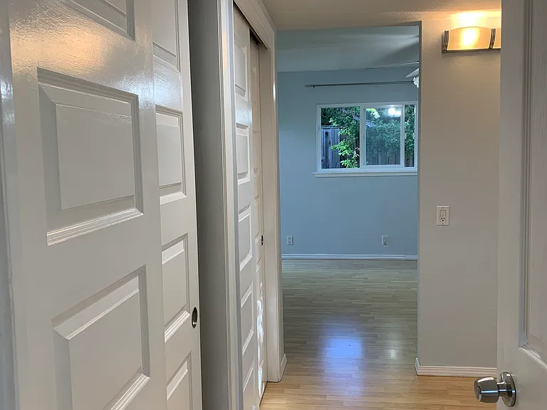Primary suite with custom closet systems and a dedicated dressing area