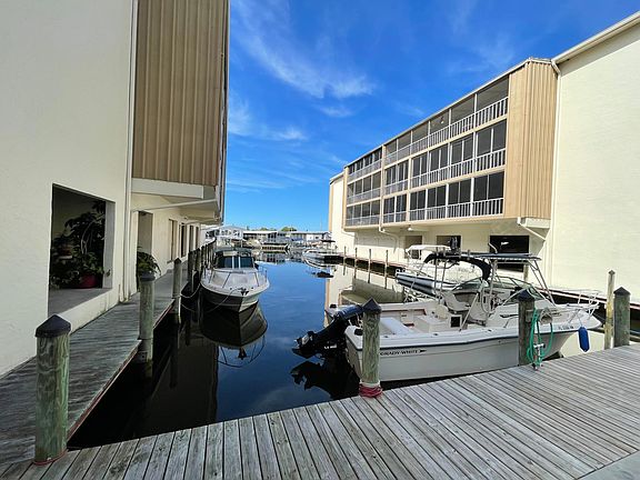 Balcony view of canal with boat slip available.