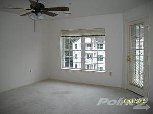 Living room with door to balcony