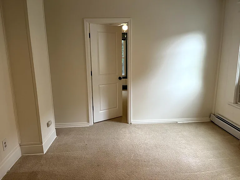 Door in living room to bedroom #1