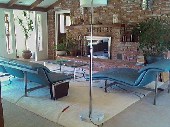 Lvng Room with vaulted ceiling, fireplace, and entry