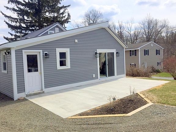 Large rear patio great for entertaining.  Easy entrance to t