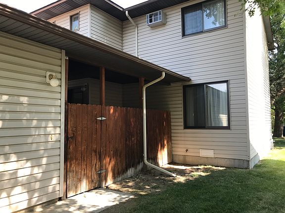 Privacy fenced patio at front entry.