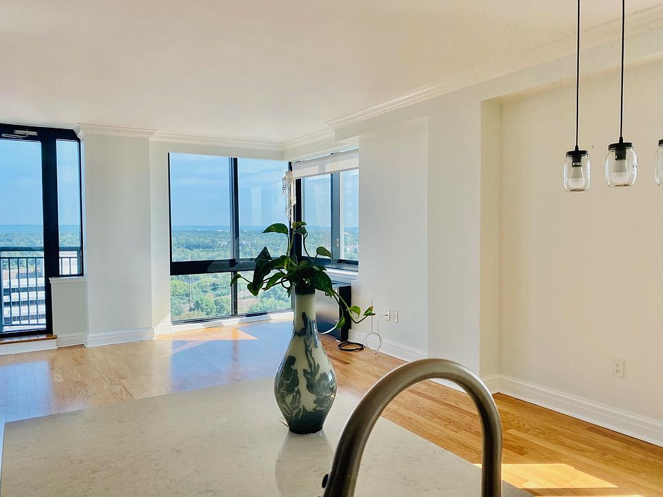 Large living room with floor to ceiling windows for plenty of natural light and amazing views