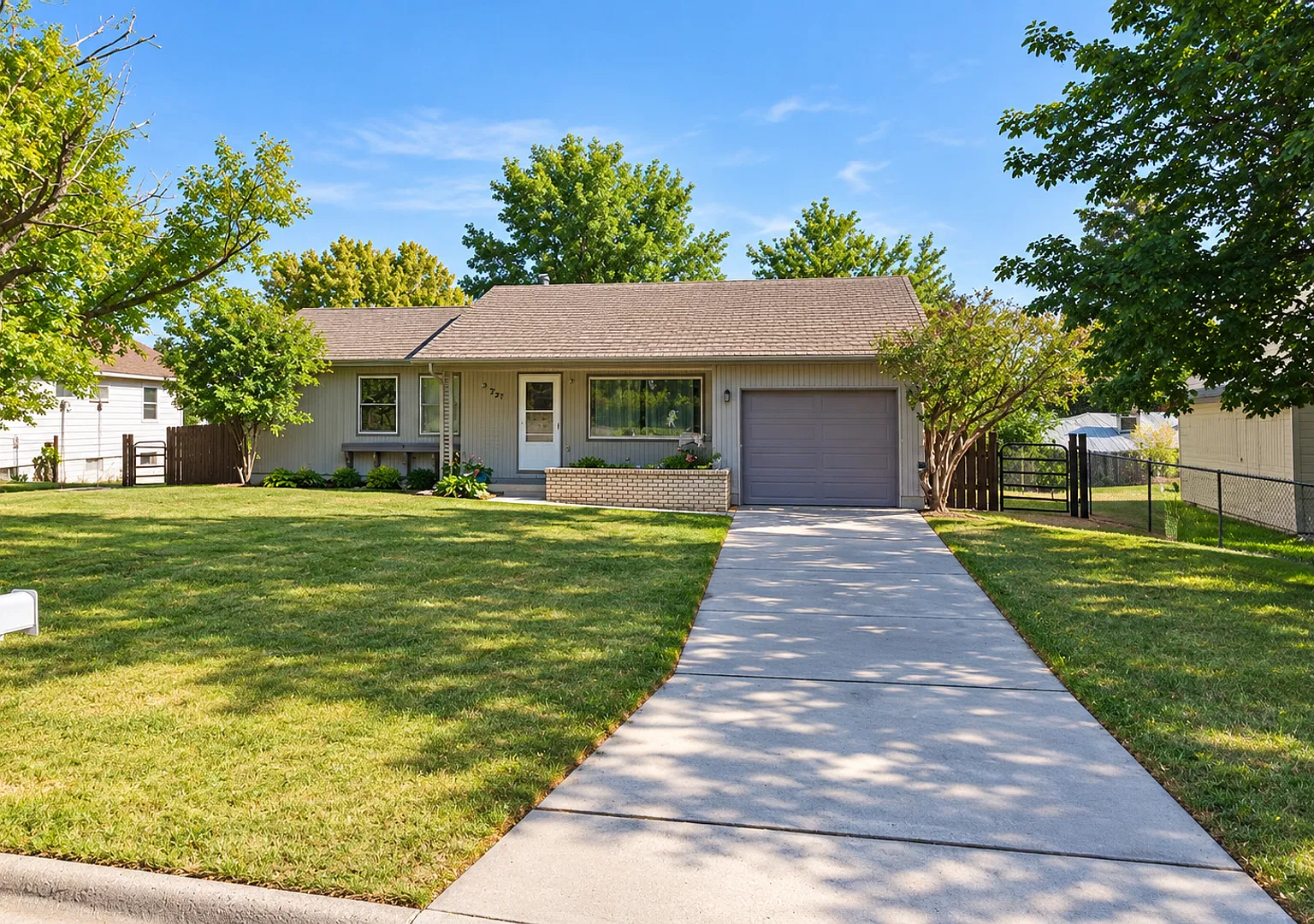 Charming 4-Bedroom Home with Fenced Yard & Garage — Photo 1