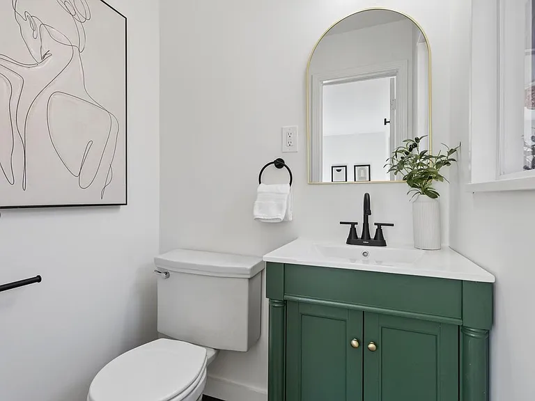 1/2 bath off 2nd bedroom