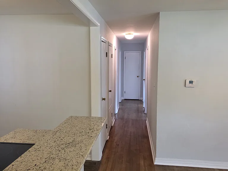 Living room looking down hall towards bedrooms