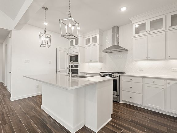 Kitchen with stainless-steel appliances