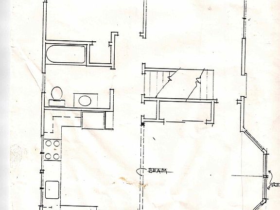 Floor plan, main floor. Kitchen and dining area at bottom of the drawing, living room and office space at the top. Street side is to the right.